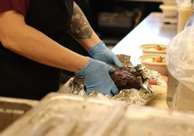 Preparing meat in aluminum foil